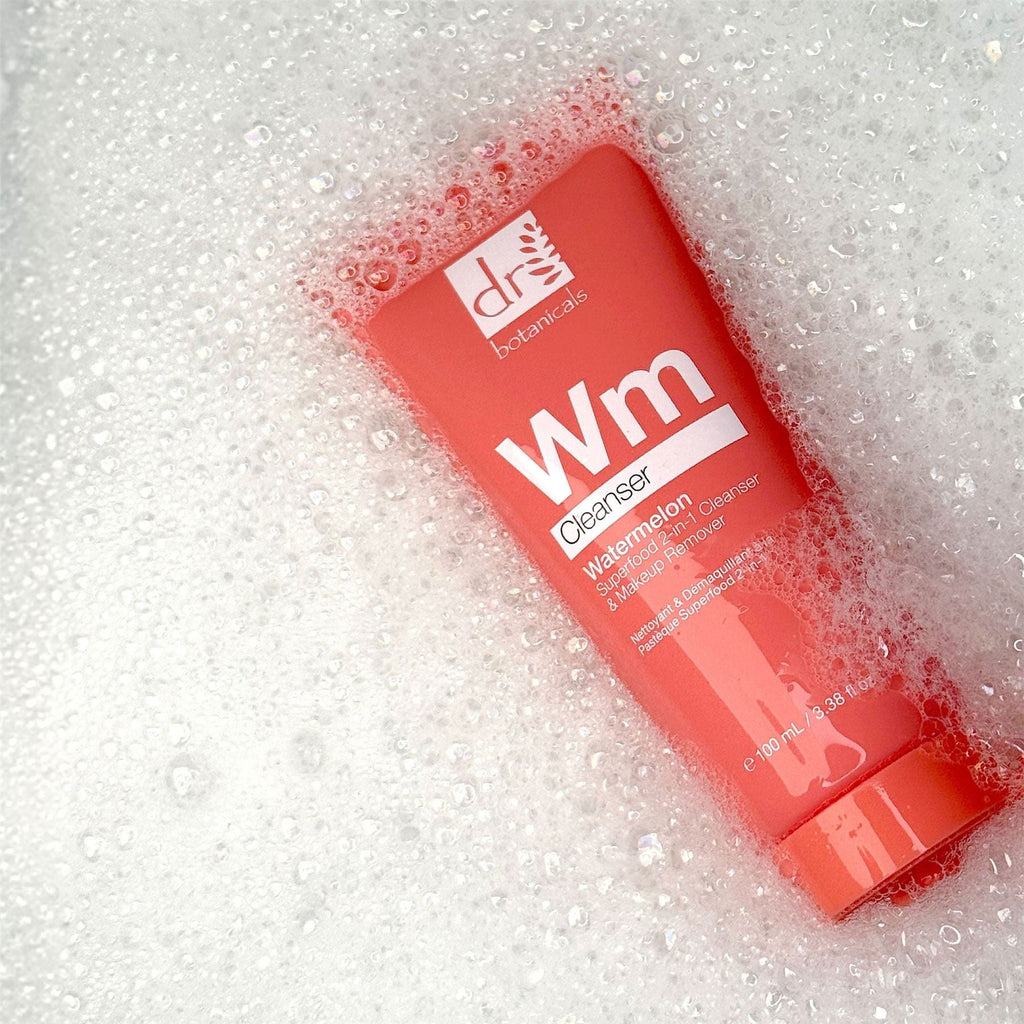 Applying Dr Botanicals Watermelon Cleanser to cleanse the face