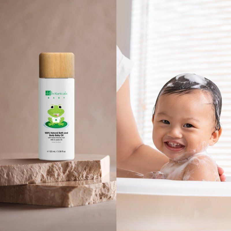 Gentle baby massage using Dr Botanicals baby body oi