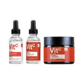 Dr Botanicals Vitamin C skincare set with two facial serum bottles and Vitamin C and Vitamin E moisturiser jar